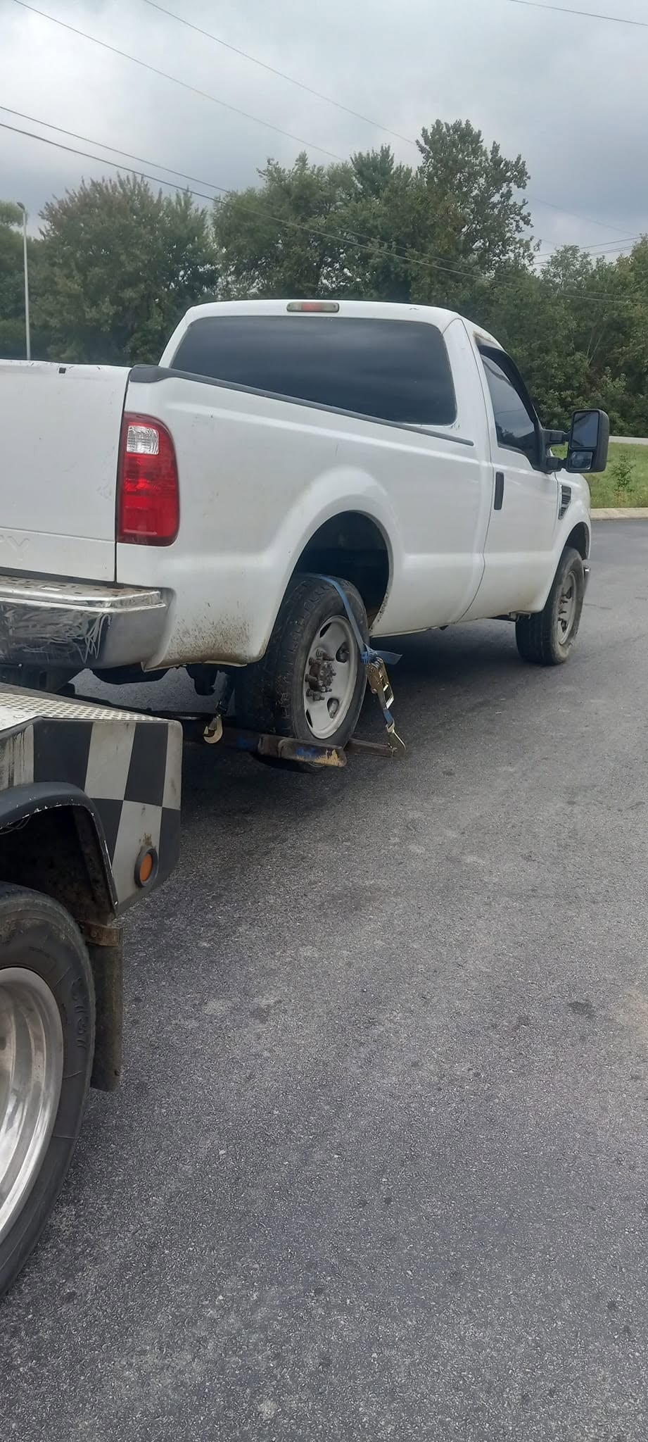 Pickup truck secured for towing